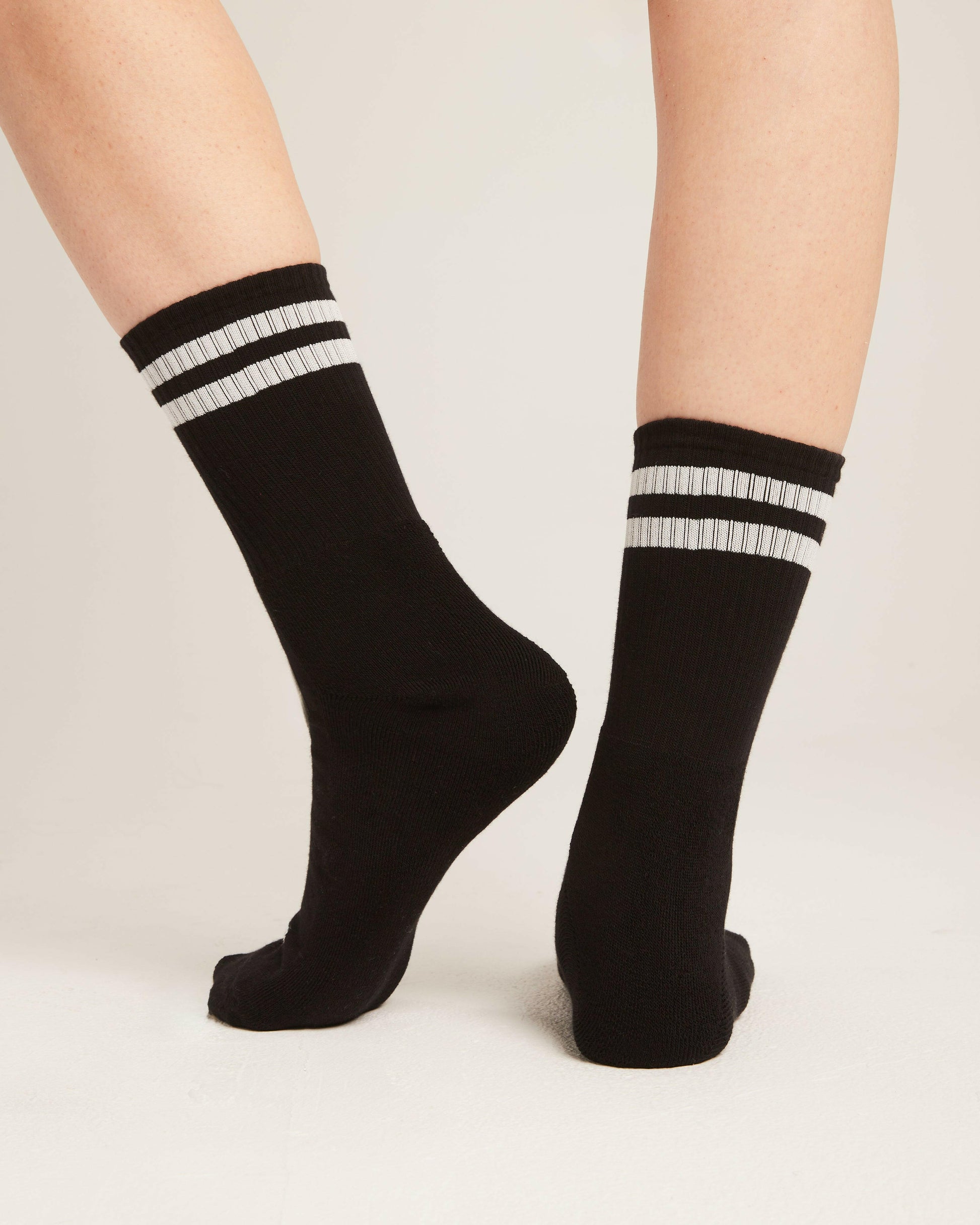 2 strips black socks.