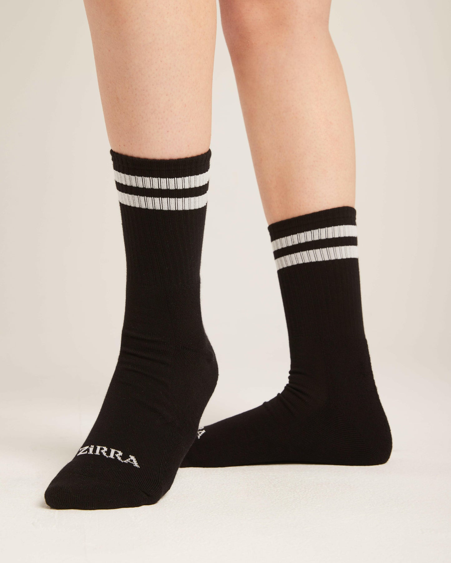 2 strips black socks.