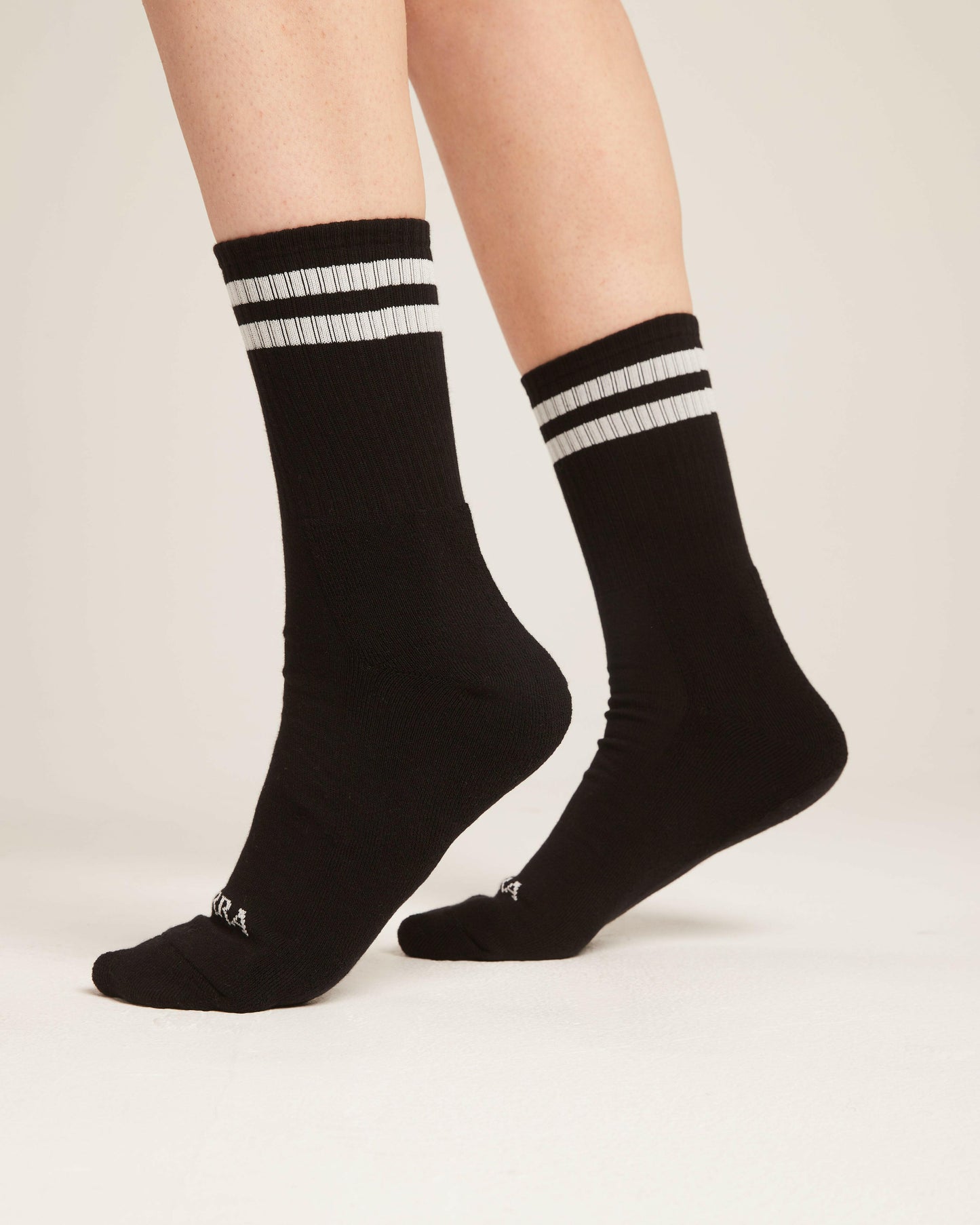 2 strips black socks.